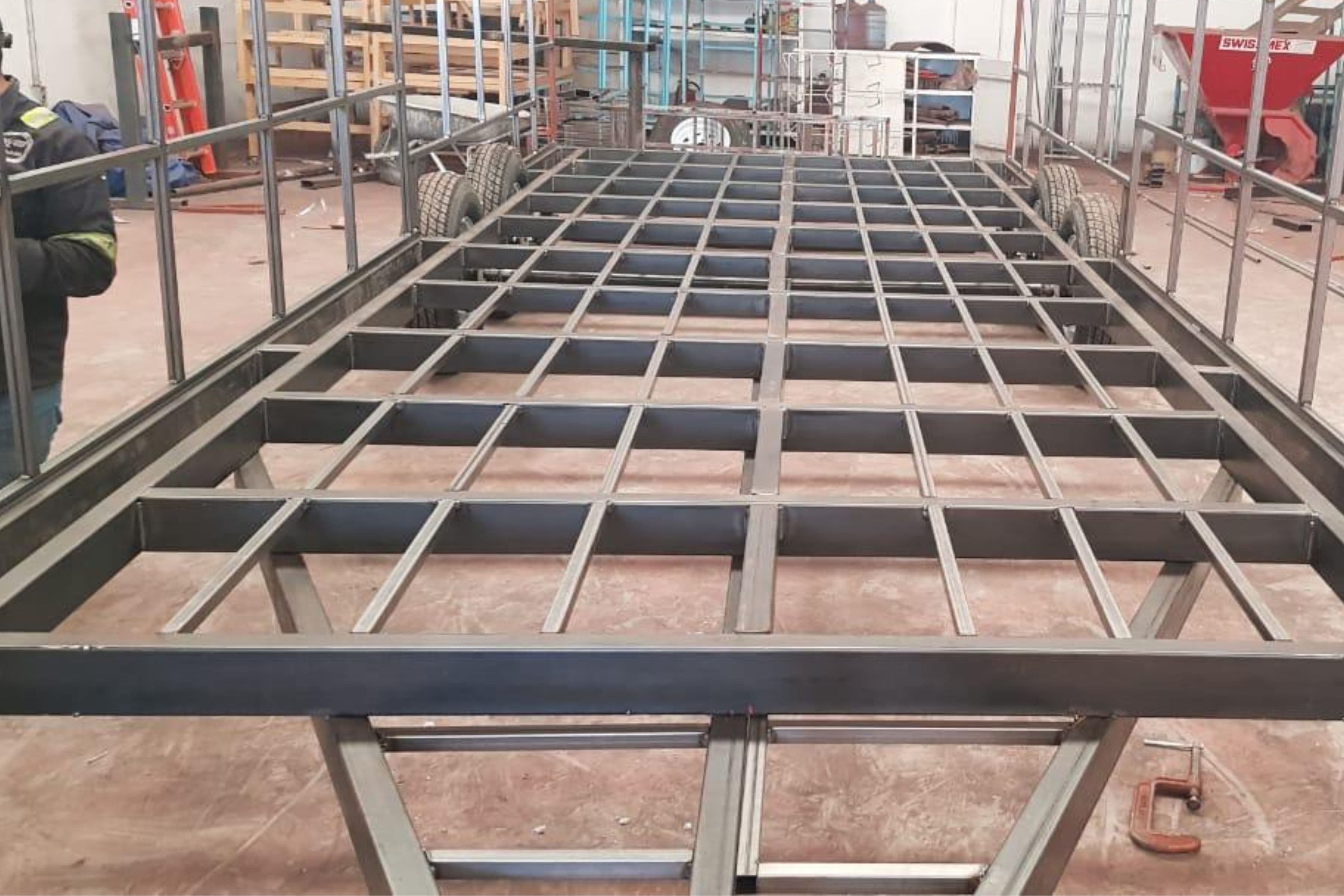 Welded steel food trailer chassis on the shop floor mid-build